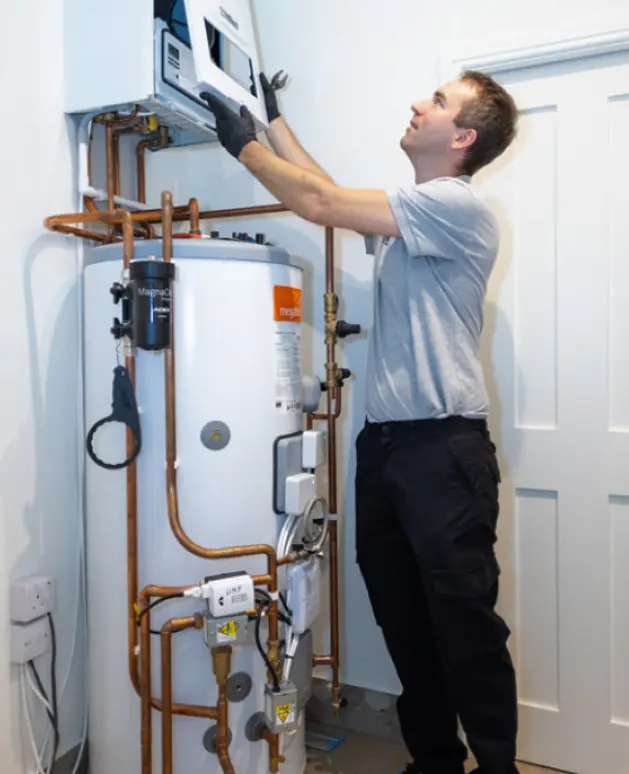 Citywide Plumbers engineer working on a boiler